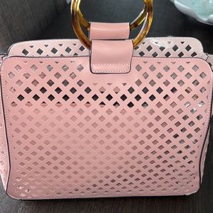 Beautiful pink two piece handbag with crossbody strap. Can use both ways.
